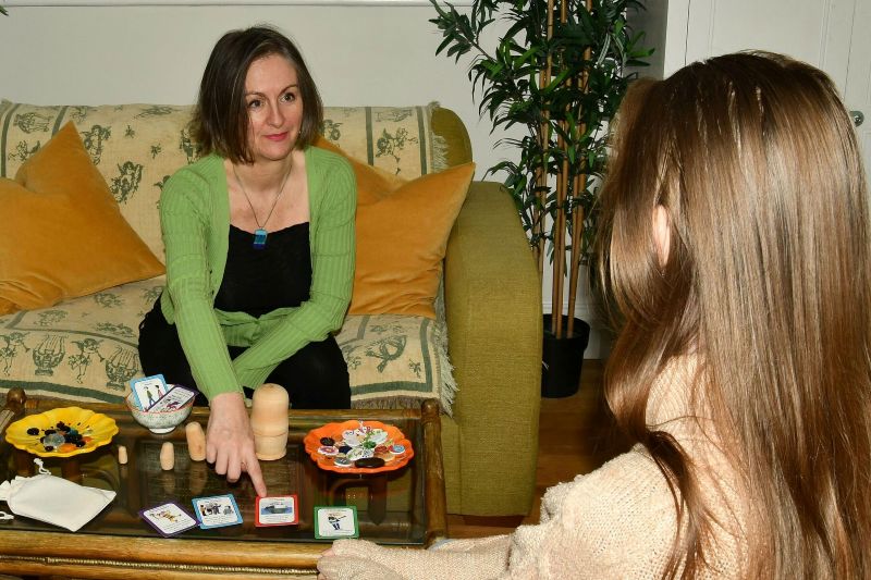 Jenny Pointing To Cards